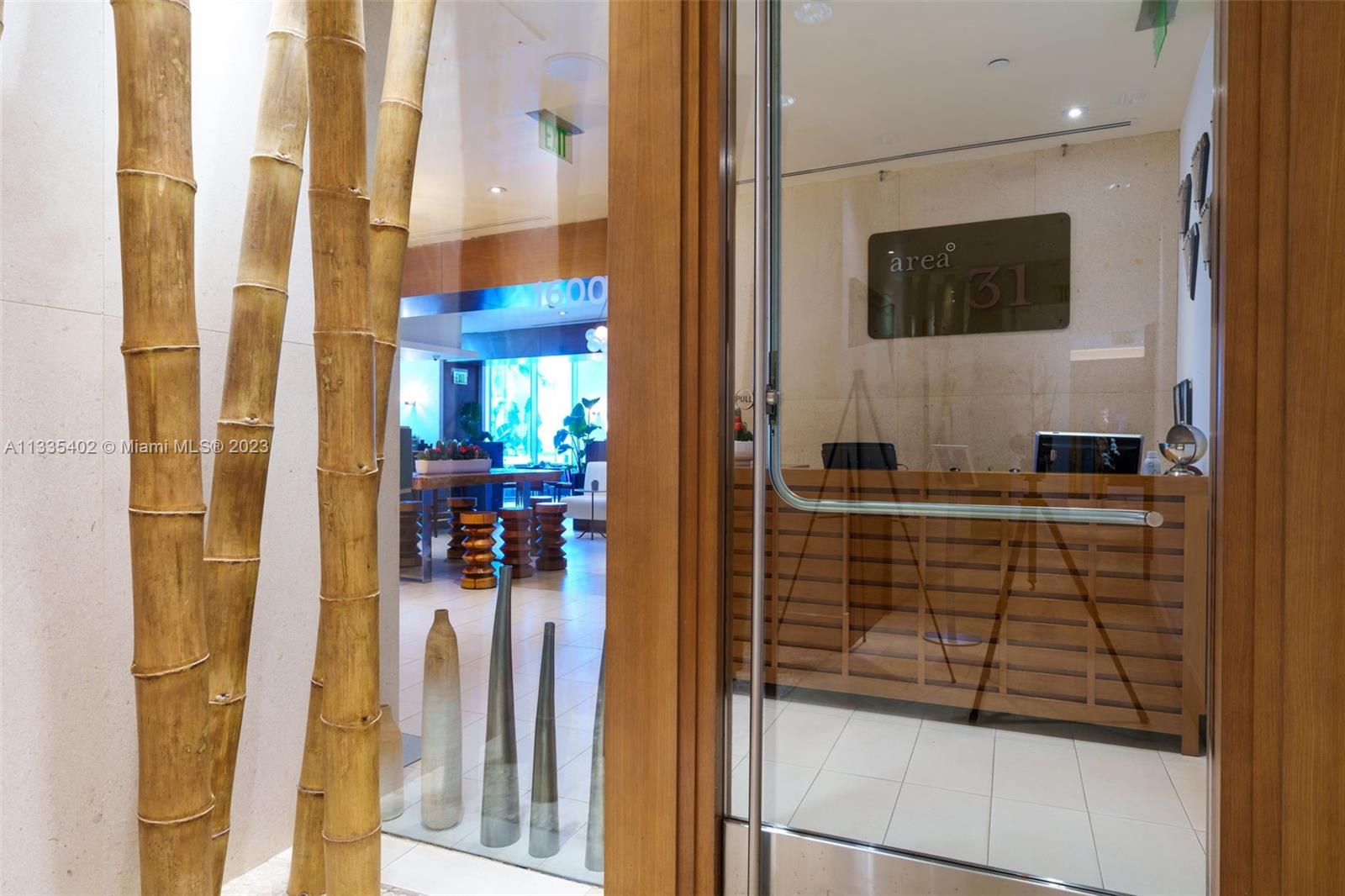 200 Biscayne Blvd Way, Unit 1404 Miami, FL 33131 - Photo 29 of 32 a bathroom with a sink and a mirror