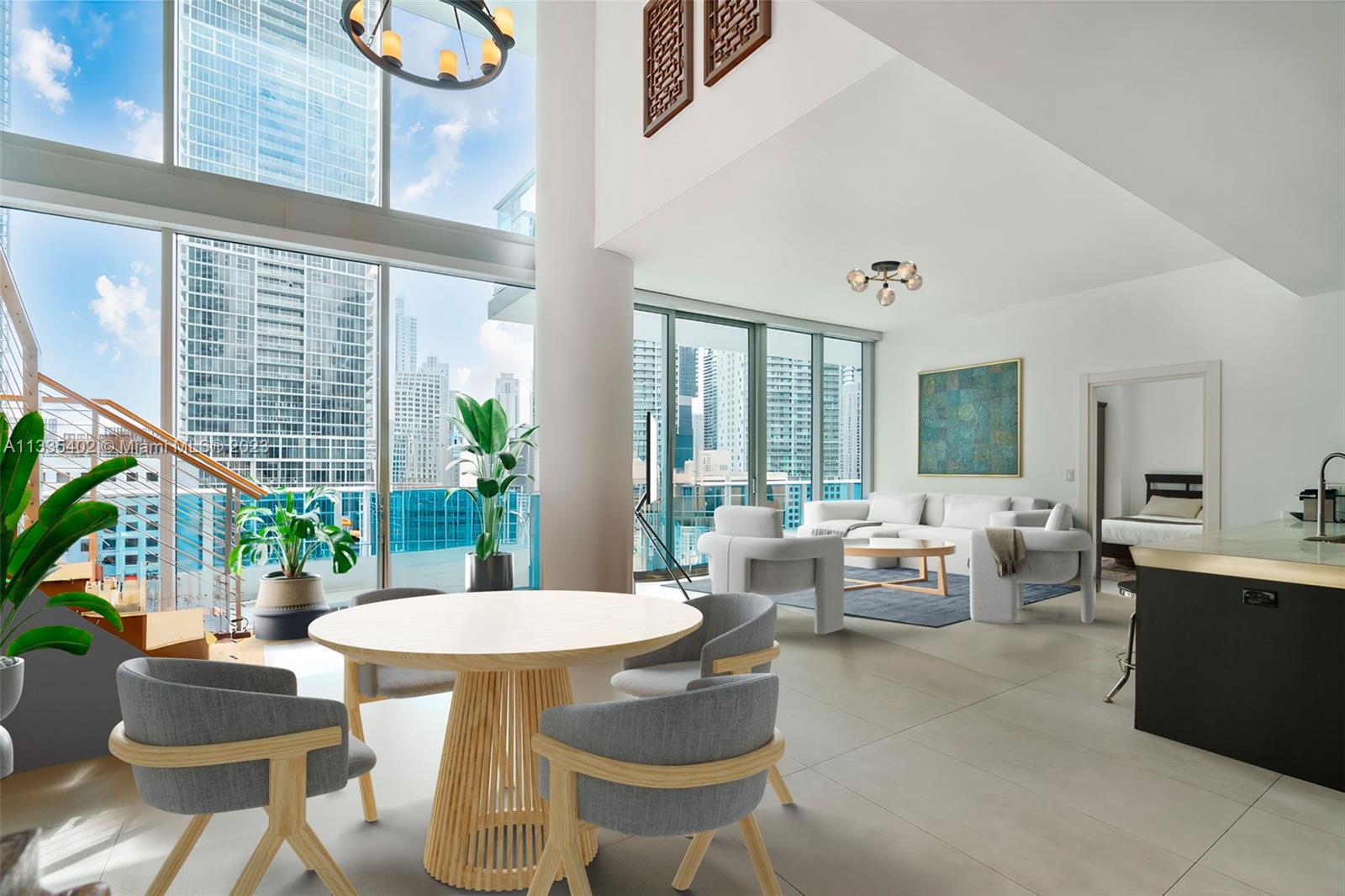 200 Biscayne Blvd Way, Unit 1404 Miami, FL 33131 - Photo 5 of 32 a view of a dining room with furniture and chandelier
