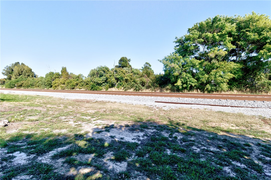 7571 Boxelder Road Micco, FL 32976 - Photo 27 of 36 a view of an ocean and beach