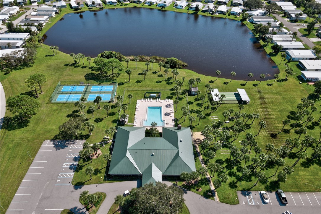 7571 Boxelder Road Micco, FL 32976 - Photo 30 of 36 an aerial view of a house with a yard