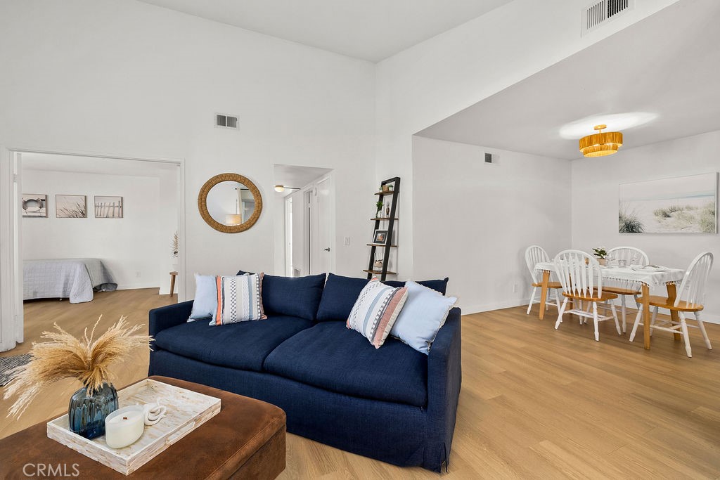 34128 Selva Road, Unit 267 Dana Point, CA 92629 - Photo 12 of 44 a living room with furniture and wooden floor