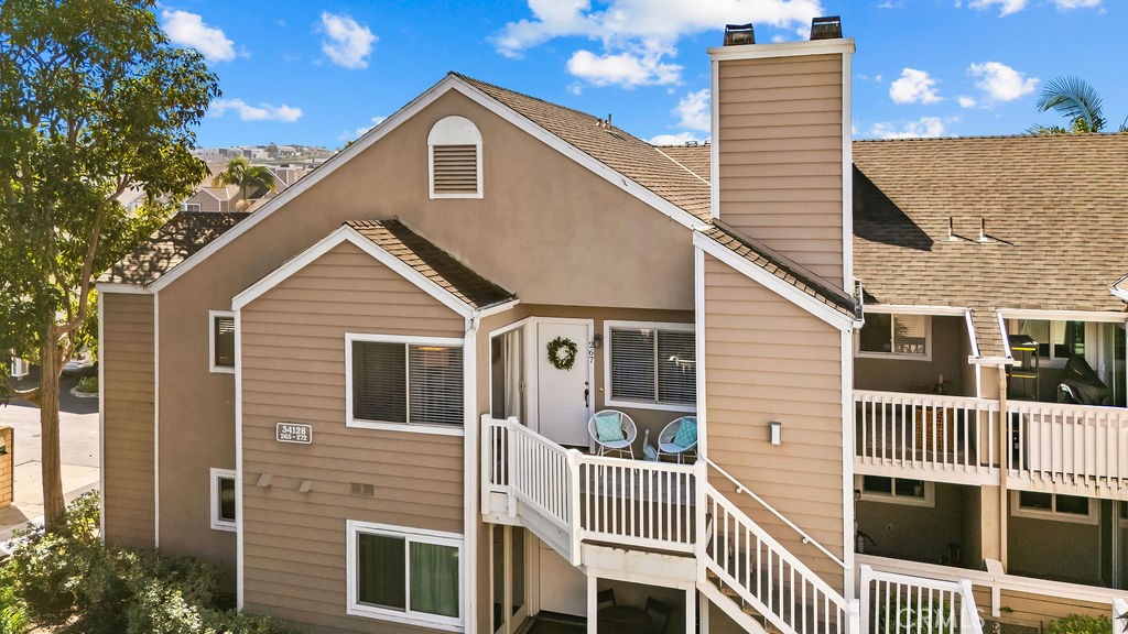 34128 Selva Road, Unit 267 Dana Point, CA 92629 - Photo 4 of 44 a front view of a house with a yard