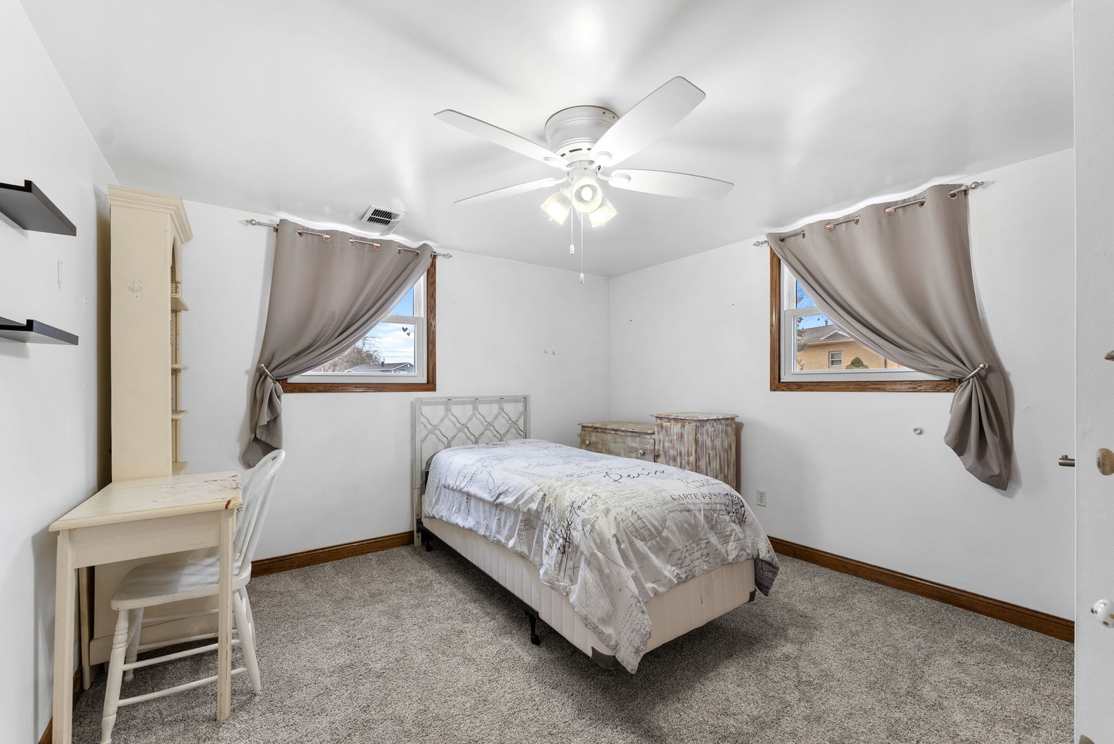 110 Andrea Court Cleveland, IL 61241 - Photo 18 of 23 a bedroom with a bed and a painting on the wall
