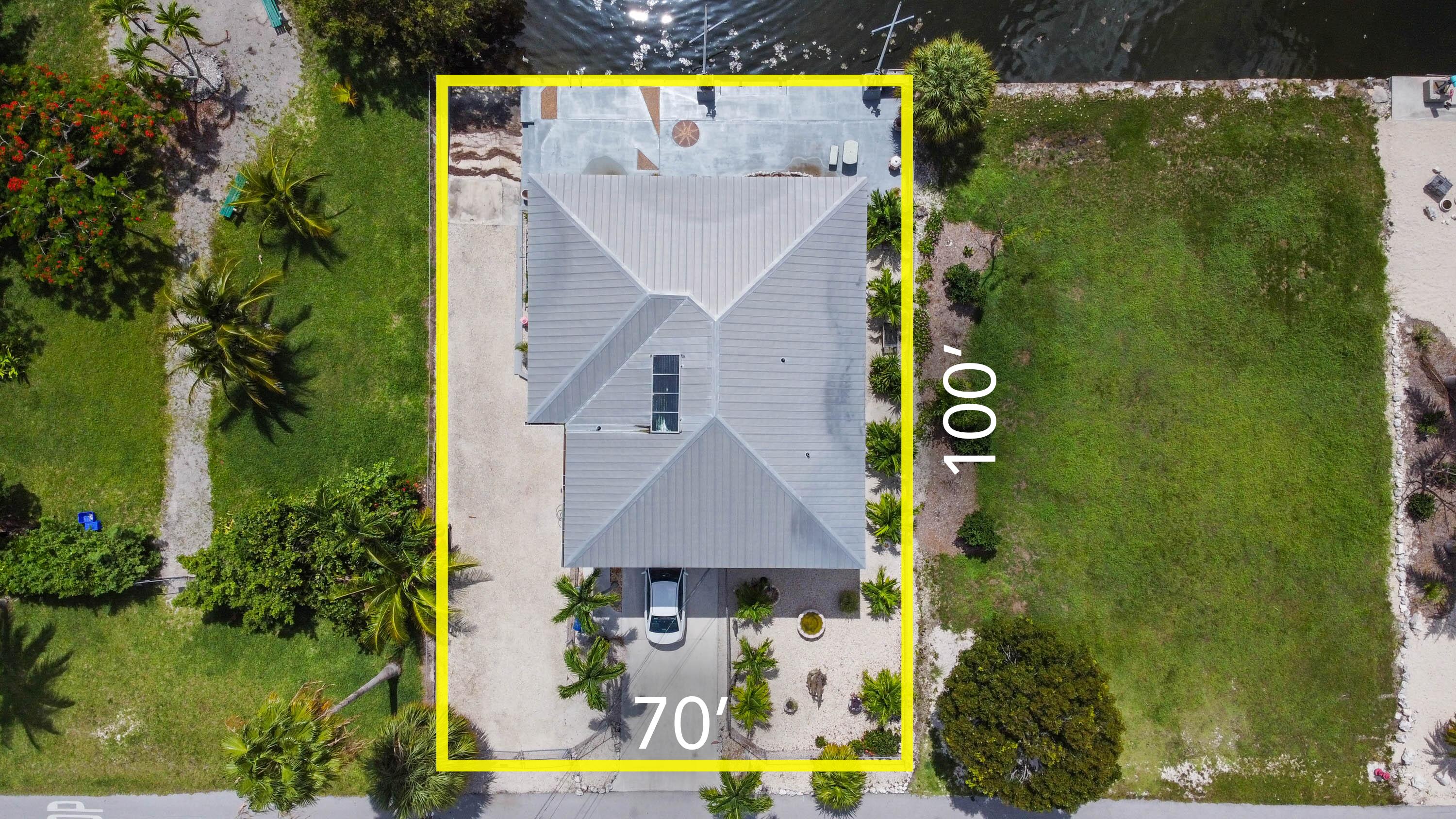 3814 Joyce Road Big Pine Key, FL 33043 - Photo 2 of 40 an aerial view of swimming pool patio and outdoor seating