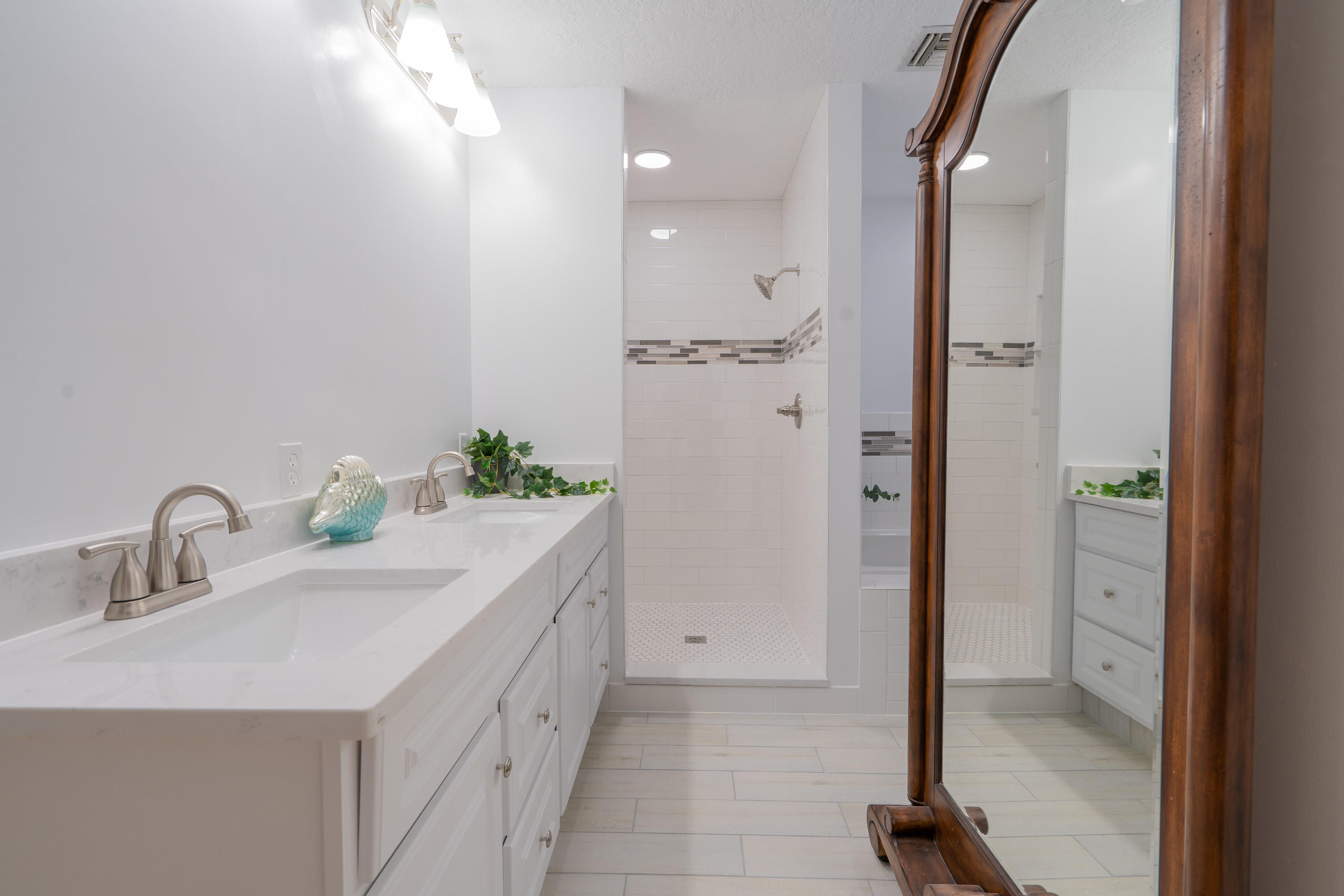 3814 Joyce Road Big Pine Key, FL 33043 - Photo 14 of 40 a bathroom with a sink and a mirror