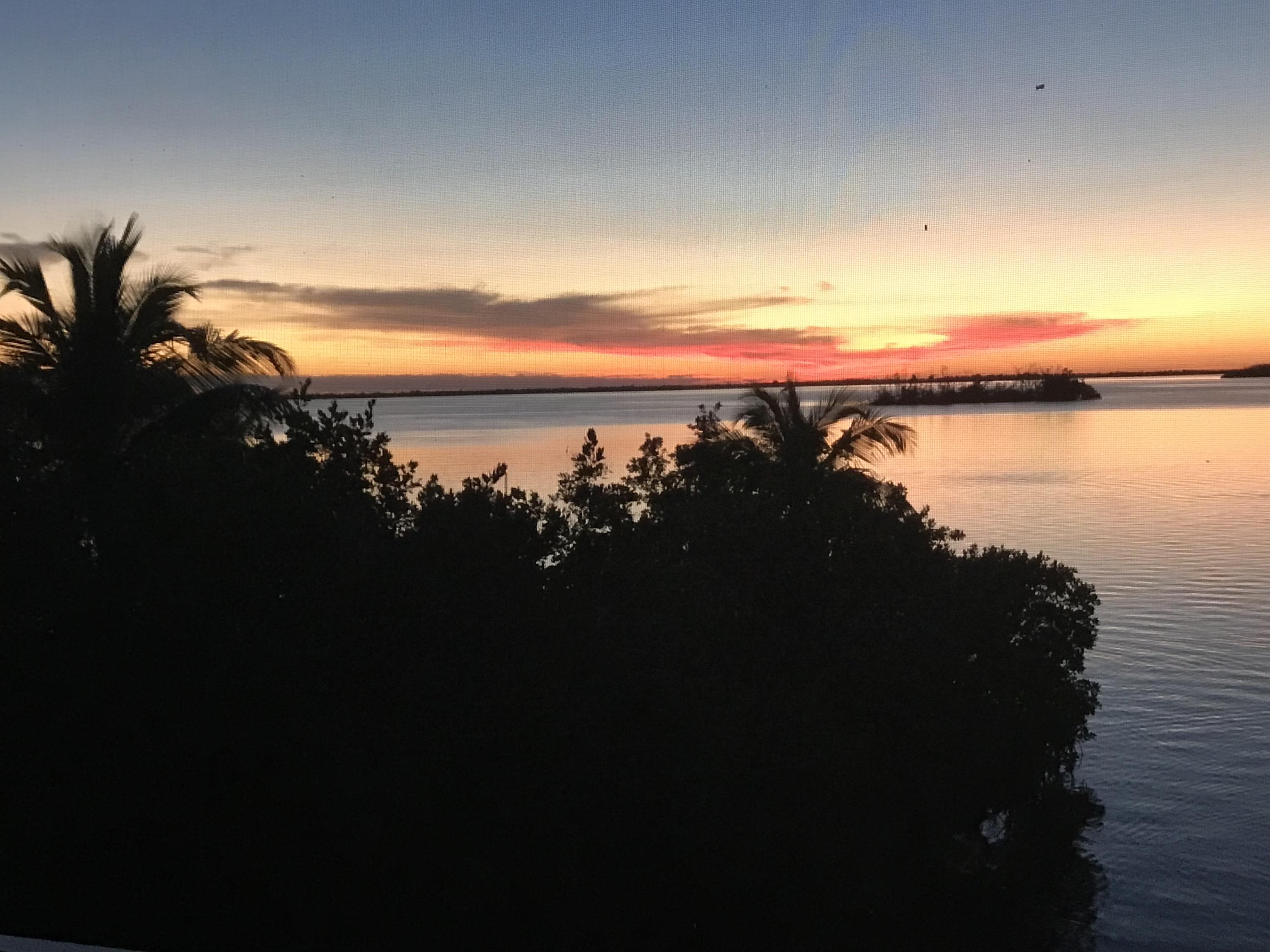 3814 Joyce Road Big Pine Key, FL 33043 - Photo 37 of 40 a view of a lake and sunset