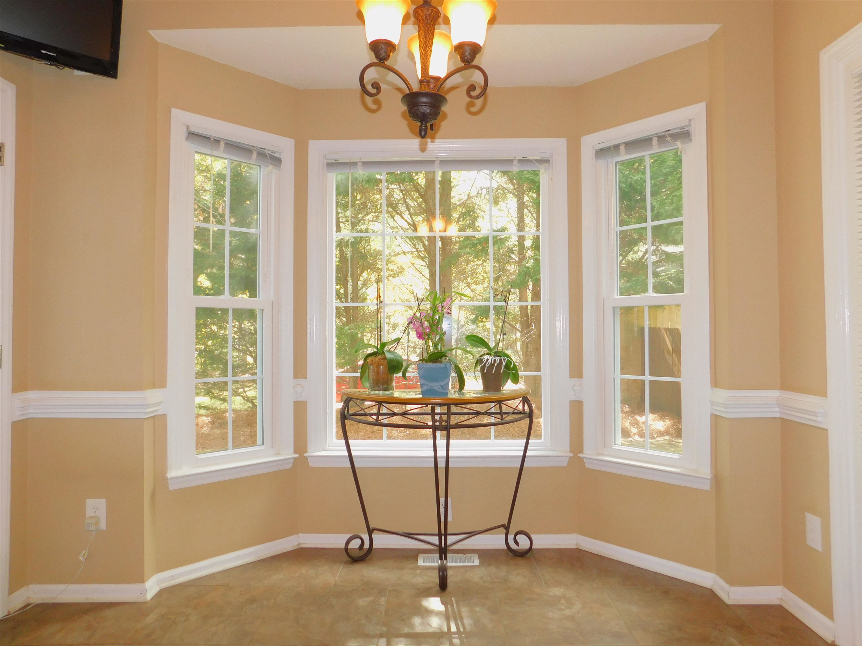 213 Goldfield Drive Garner, NC 27529 - Photo 11 of 18 a view of a room that has a window in it