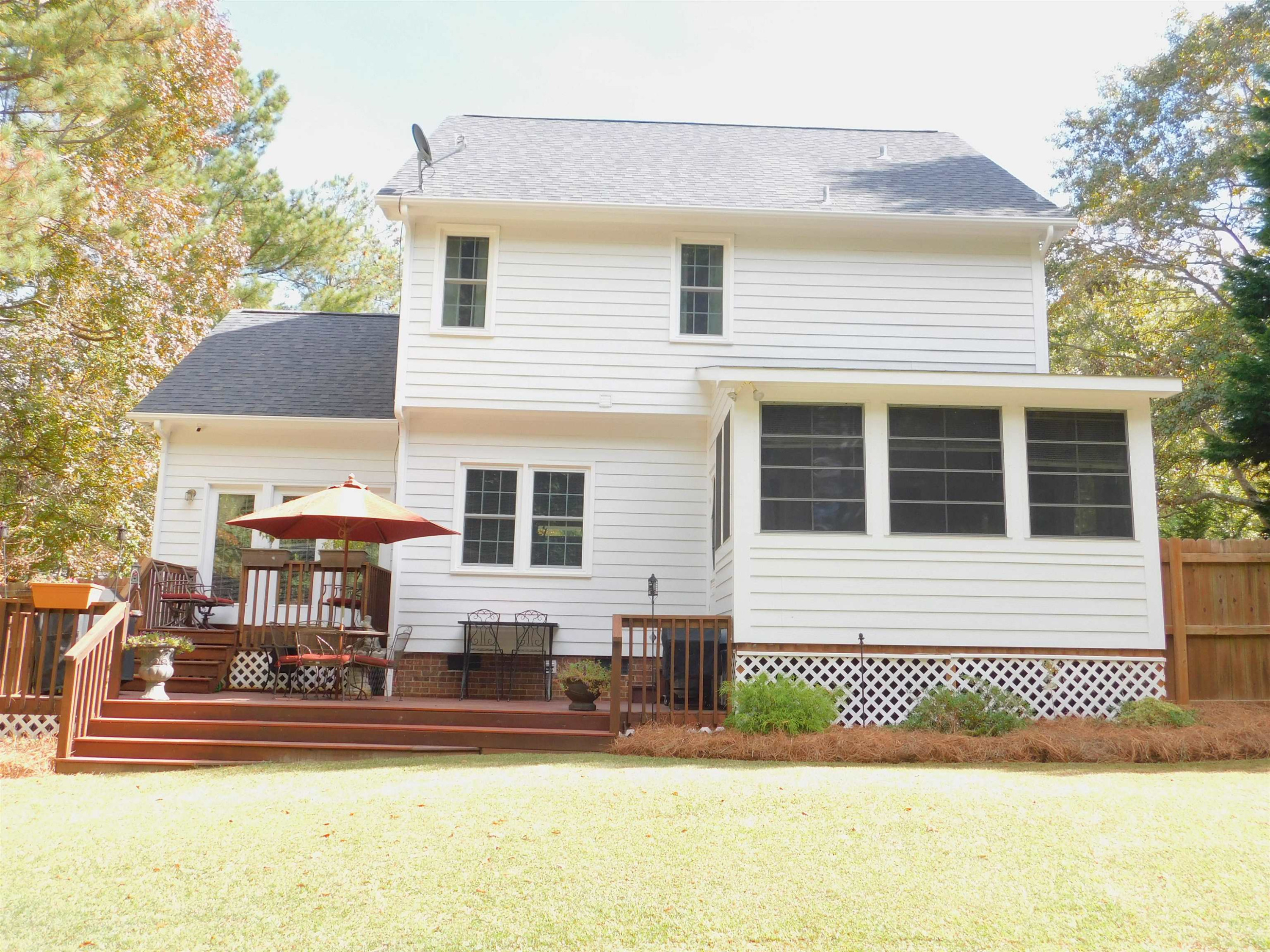 213 Goldfield Drive Garner, NC 27529 - Photo 4 of 18 a front view of a house with a yard