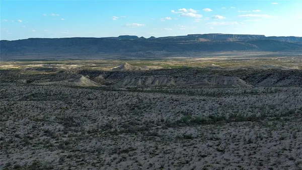 a view of ocean and mountain