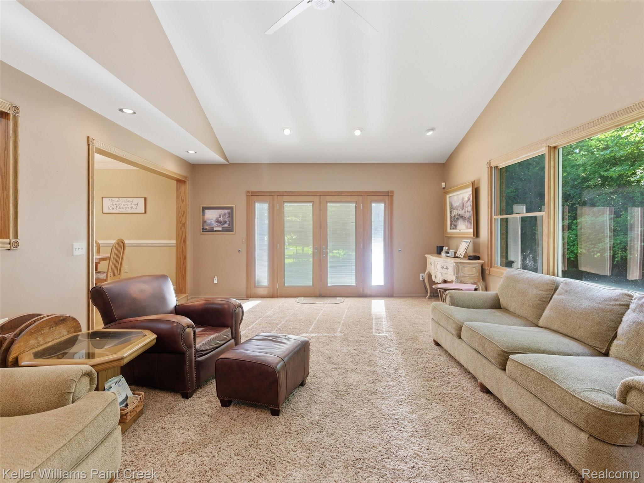 2842 Manorwood Road Troy, MI 48085 - Photo 31 of 72 Living area featuring a vaulted ceiling with recessed lighting and a ceiling fan