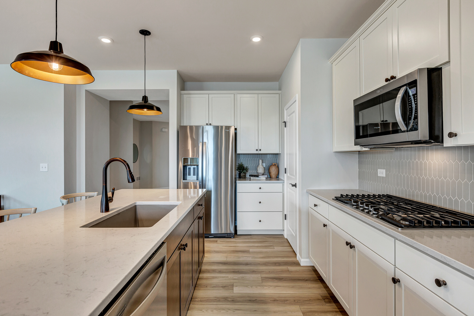 2810 Spring Circle South Lindenhurst, IL 60046 - Photo 7 of 15 a kitchen with stainless steel appliances granite countertop a sink a stove and a refrigerator