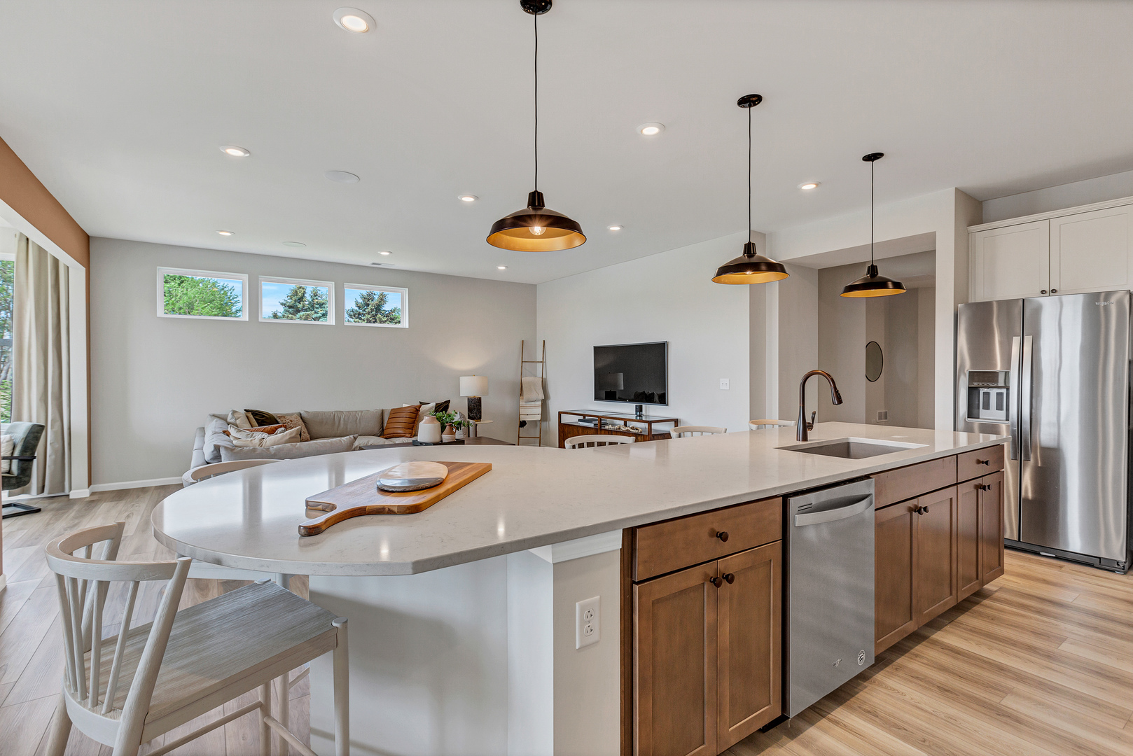 2810 Spring Circle South Lindenhurst, IL 60046 - Photo 8 of 15 a kitchen with a sink a stove and chairs