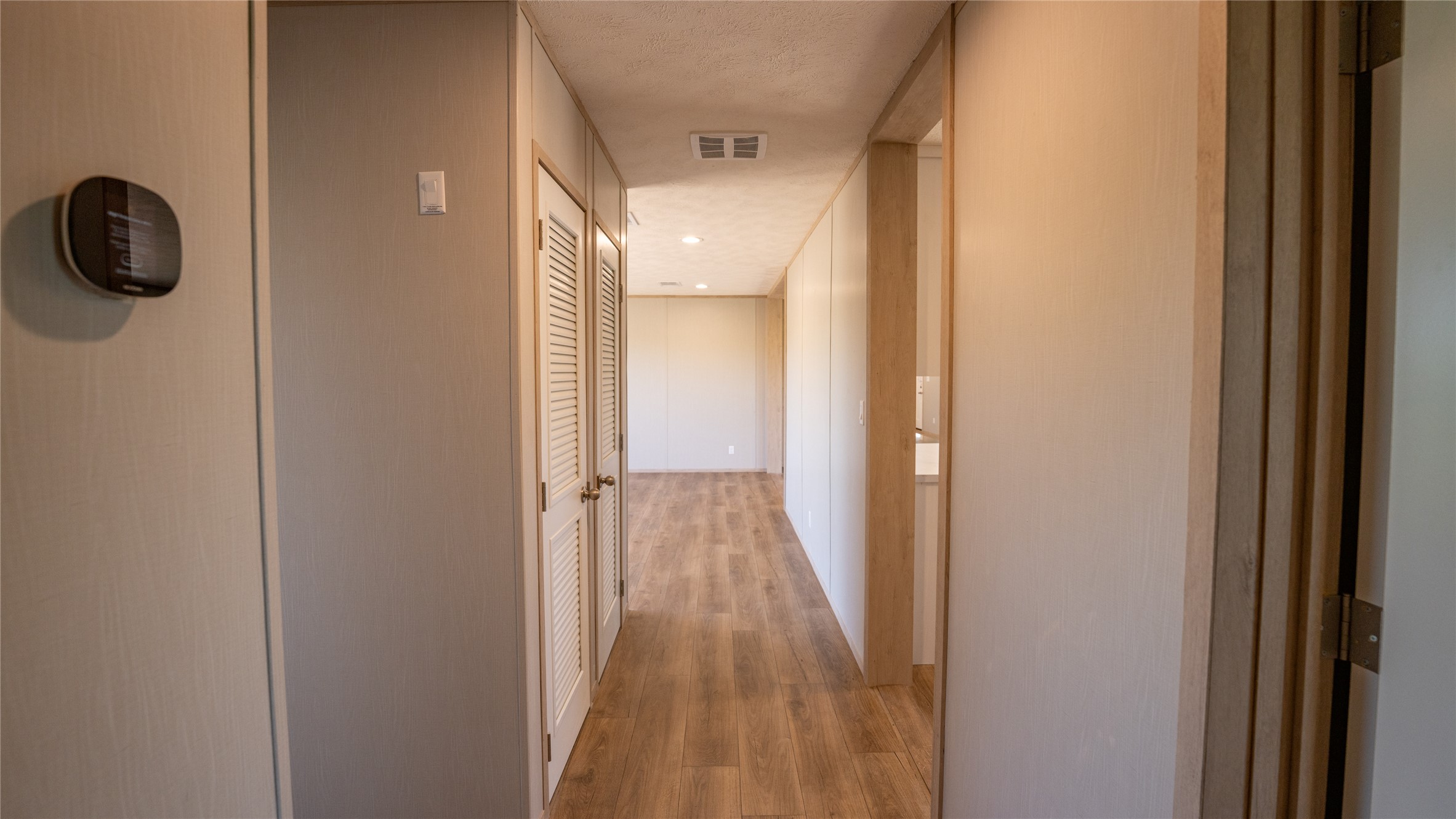 1145 Callihan Road Luling, TX 78648 - Photo 26 of 39 a view of a hallway with wooden floor