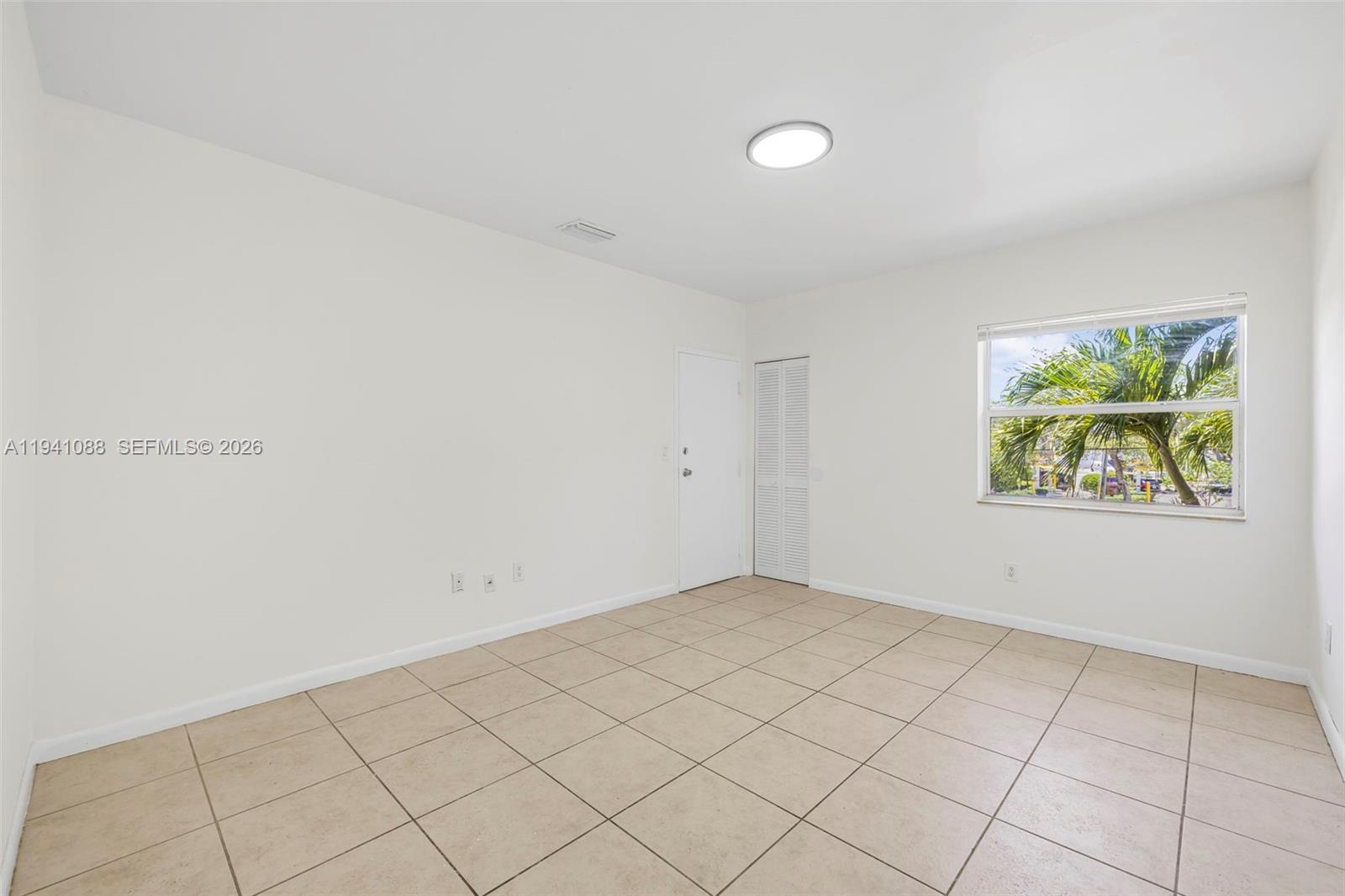 575 Northeast 82nd Street, Unit 10 Miami, FL 33138 - Photo 9 of 14 a view of an empty room