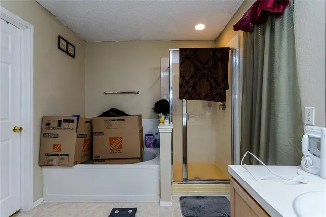 a bathroom with a sink and mirror
