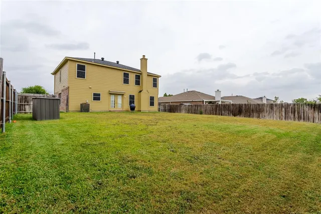 a bathroom with a sink and a yard