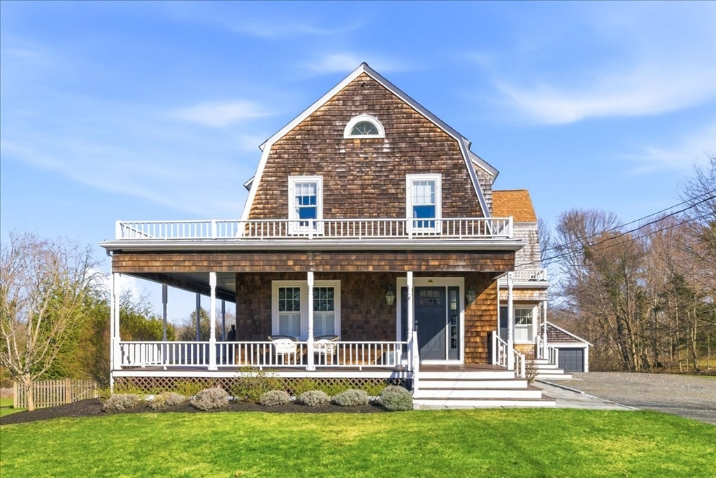 27 Curtis Street Scituate, MA 02066 - Photo 1 of 40 front view of a house with a yard