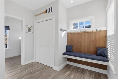 a wooden bench sitting in a room
