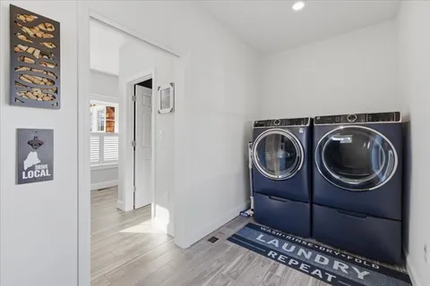 a view of a storage & utility room with washer and dryer