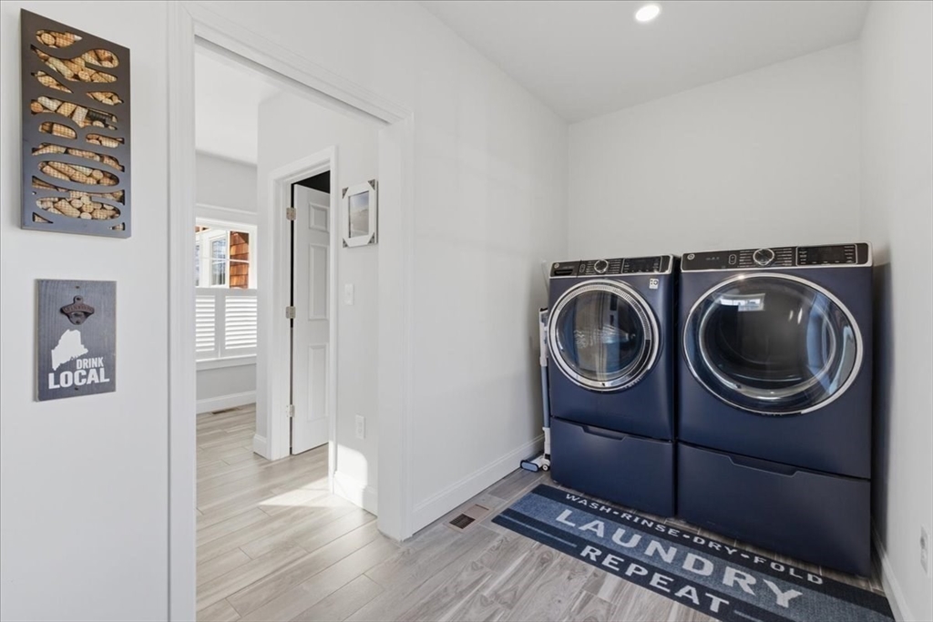 27 Curtis Street Scituate, MA 02066 - Photo 17 of 40 a view of a storage & utility room with washer and dryer