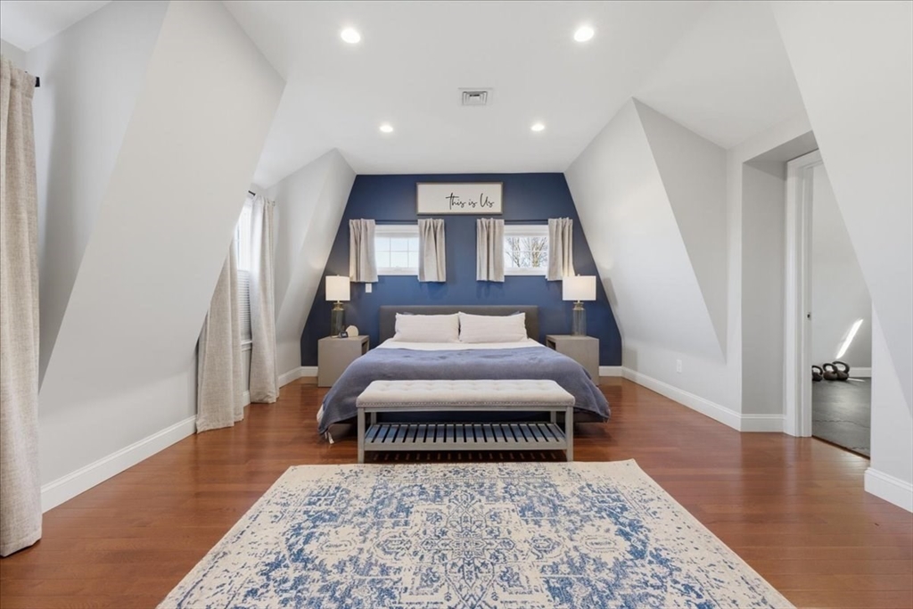27 Curtis Street Scituate, MA 02066 - Photo 19 of 40 a bedroom with a bed and a rug