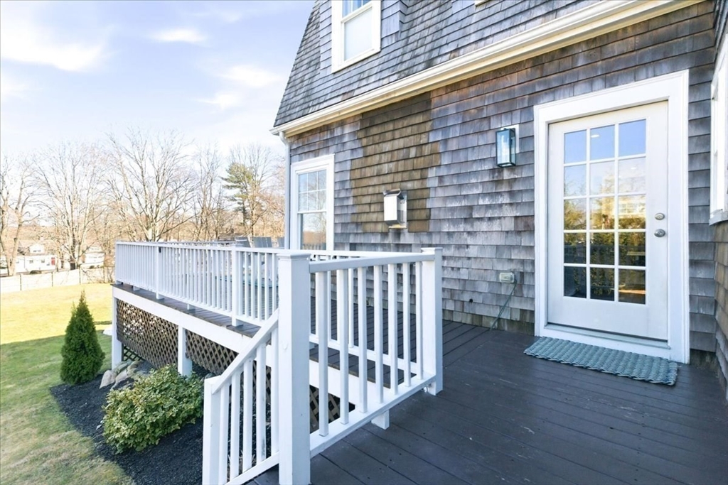 27 Curtis Street Scituate, MA 02066 - Photo 33 of 40 a view of a balcony with wooden floor