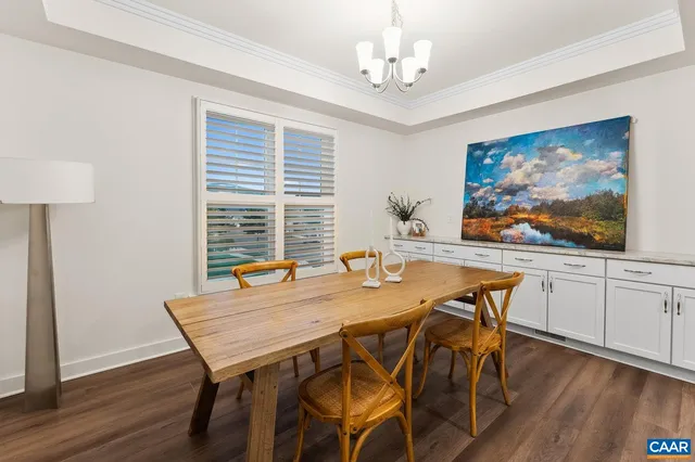 a kitchen with stainless steel appliances a sink dishwasher stove and cabinets