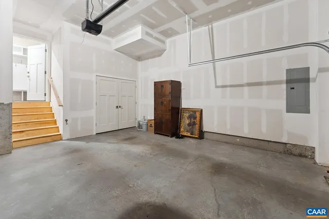 a view of a city with green space and mountain view in back