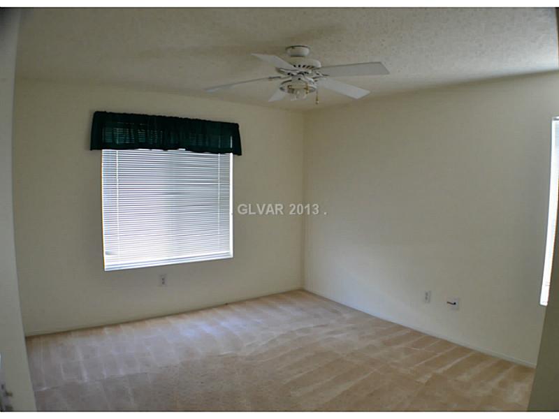 7100 West Pirates Cove Road, Unit 2046 Las Vegas, NV 89145 - Photo 12 of 16 Master Bedroom.