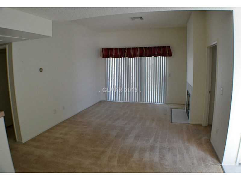 7100 West Pirates Cove Road, Unit 2046 Las Vegas, NV 89145 - Photo 9 of 16 Living Room.