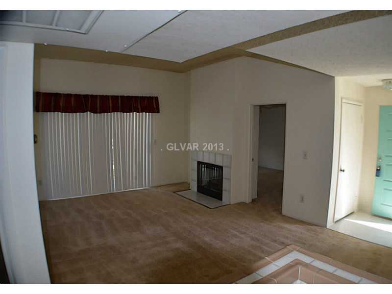 7100 West Pirates Cove Road, Unit 2046 Las Vegas, NV 89145 - Photo 10 of 16 Living Room.
