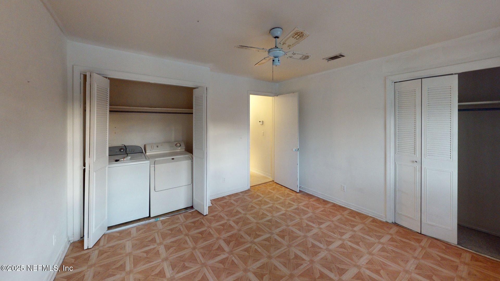 1540 El Prado Road, Unit 4 Jacksonville, FL 32216 - Photo 15 of 24 a bedroom with a bed and a view of bathroom