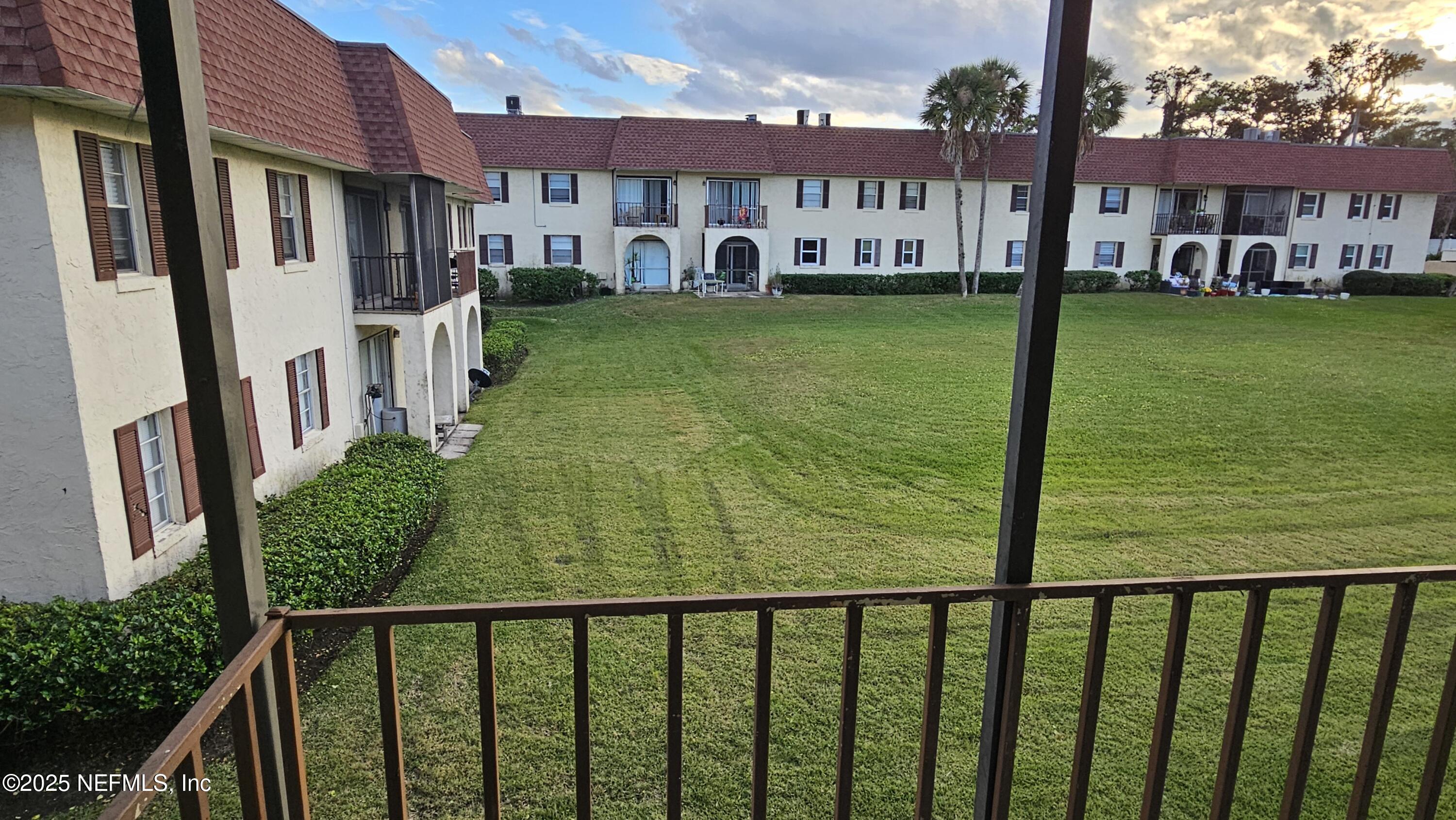 1540 El Prado Road, Unit 4 Jacksonville, FL 32216 - Photo 23 of 24 a view of a garden with a house