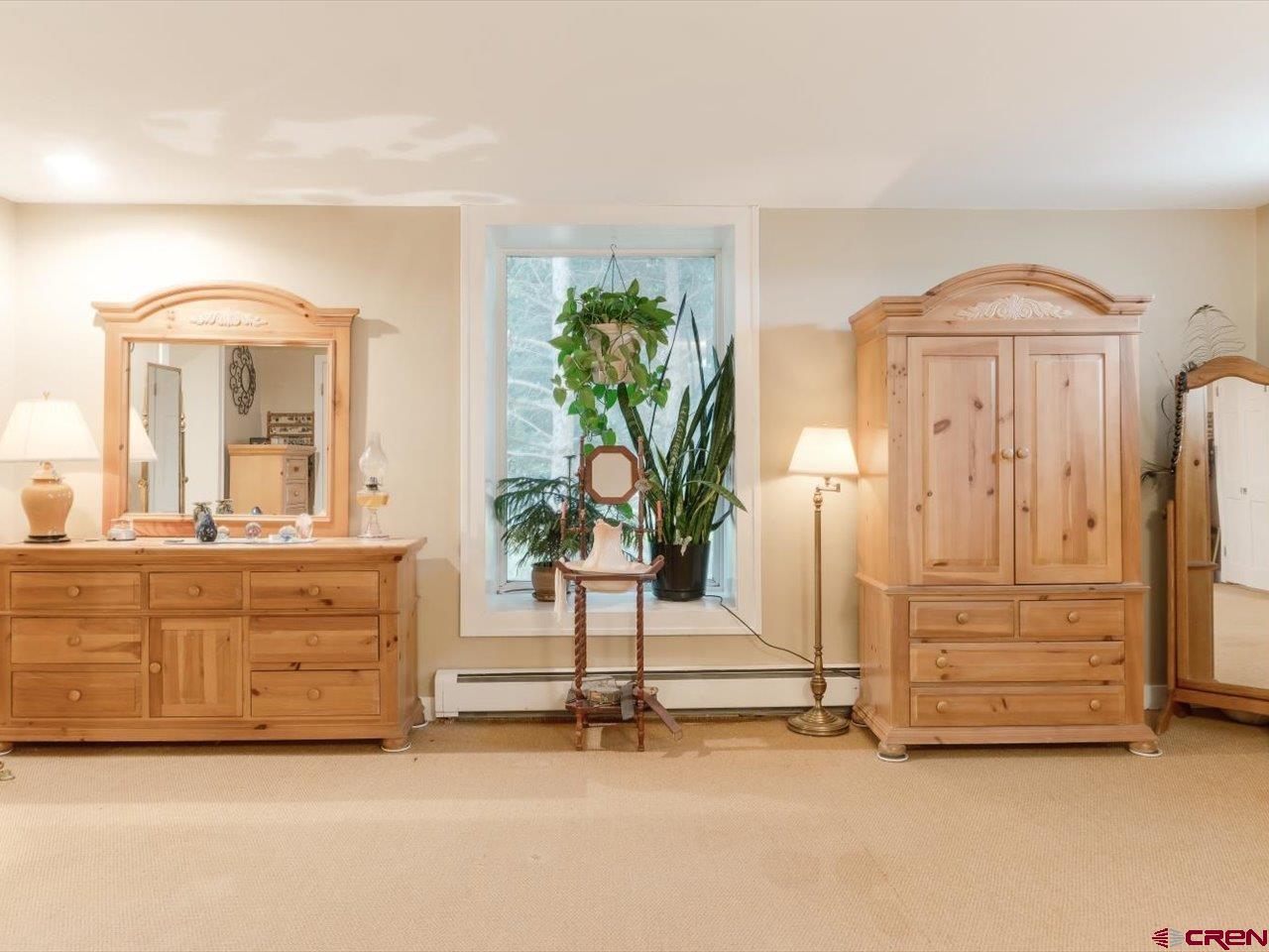 15318 6100th Road Montrose, CO 81403 - Photo 21 of 35 a view of living room with furniture and natural light