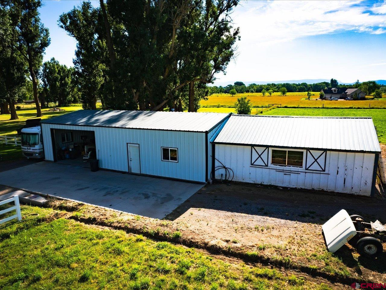 15318 6100th Road Montrose, CO 81403 - Photo 33 of 35 a view of a house with a backyard