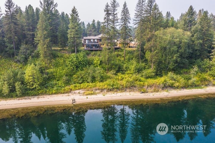 402 Northstar Road Cusick, WA 99119 - Photo 1 of 14 a view of a yard with large trees