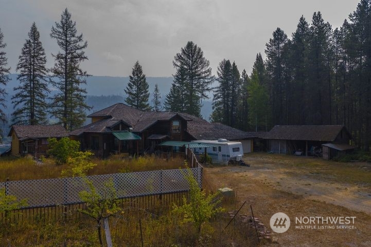 402 Northstar Road Cusick, WA 99119 - Photo 12 of 14 a view of a house with garden