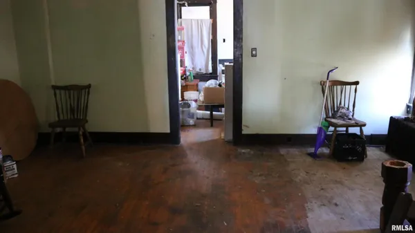 a view of a room with workspace and a window