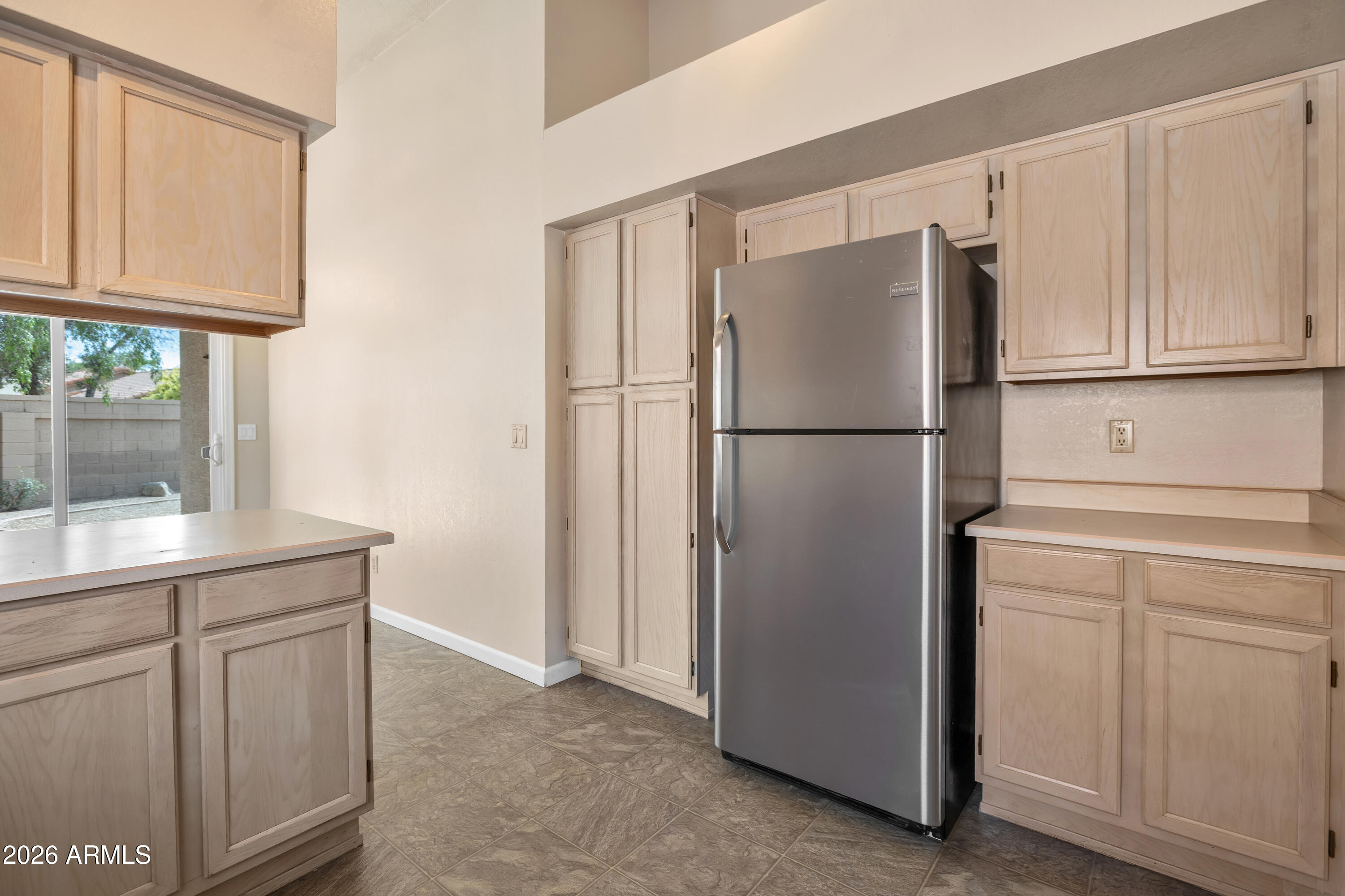 57 East Ranch Road Tempe, AZ 85284 - Photo 17 of 51 a white refrigerator freezer sitting in a kitchen