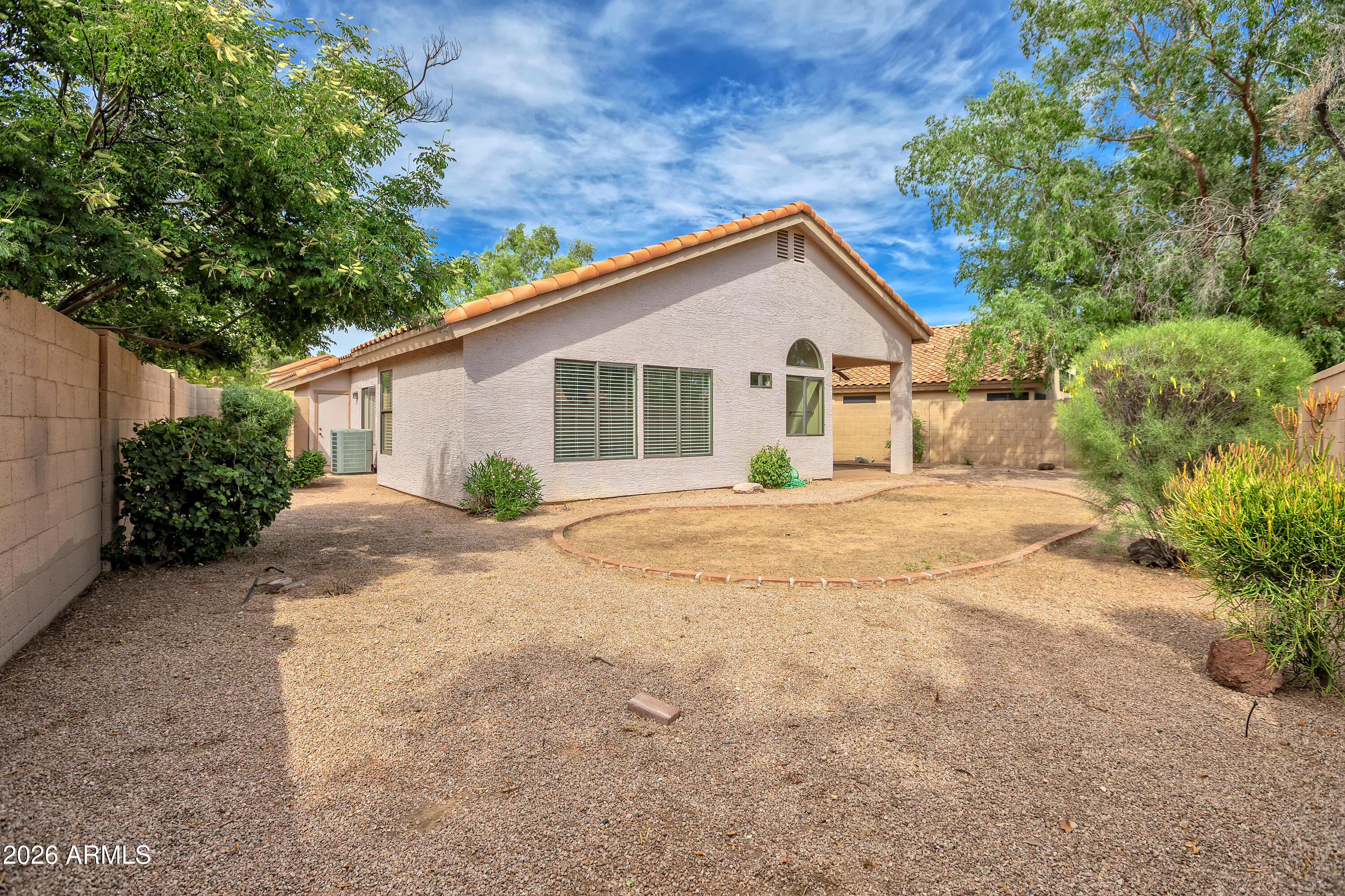 57 East Ranch Road Tempe, AZ 85284 - Photo 46 of 51 a view of a house with a yard