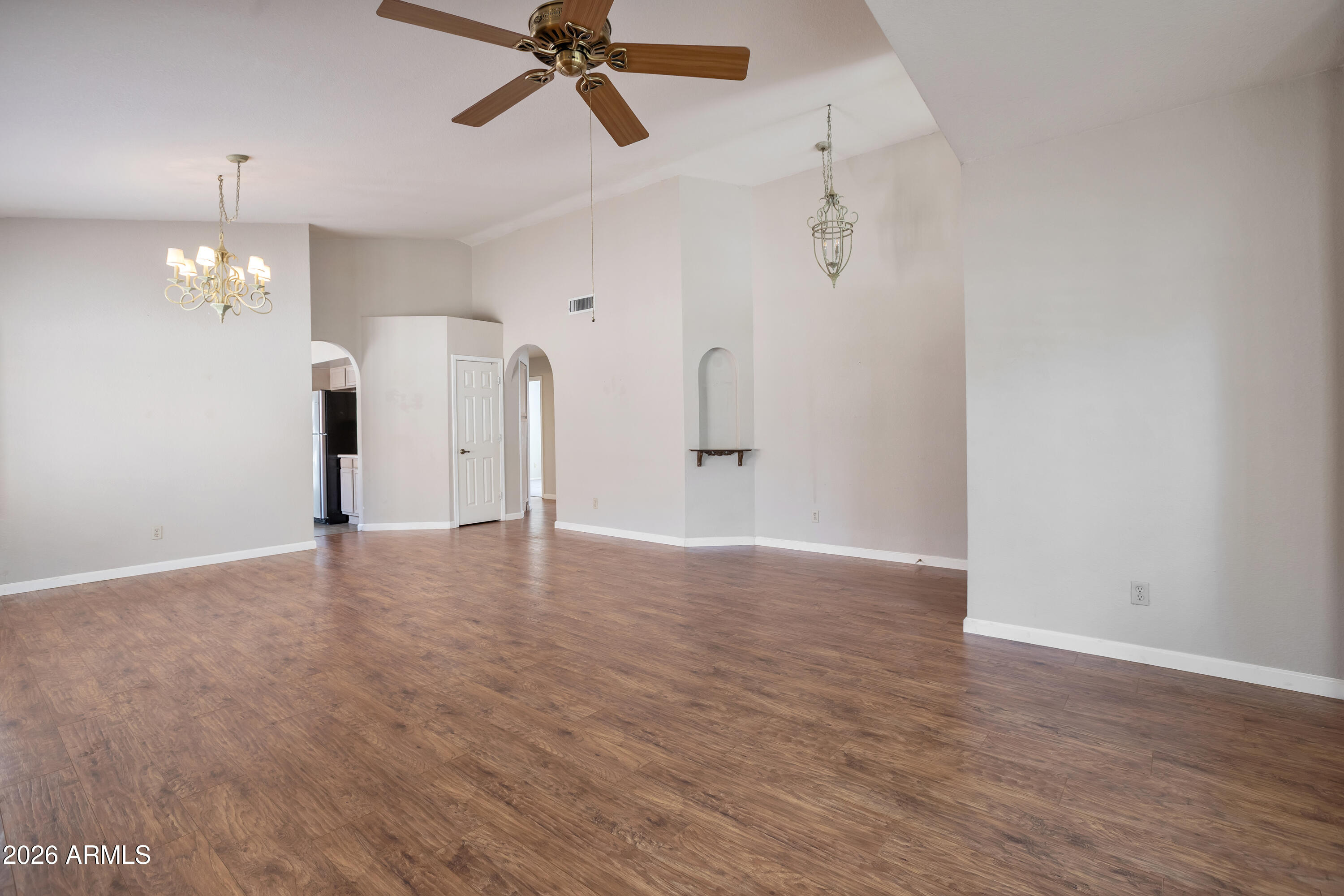 57 East Ranch Road Tempe, AZ 85284 - Photo 7 of 51 a view of a livingroom with a ceiling fan window and wooden floor
