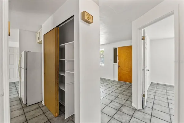 a view of an empty room with a window