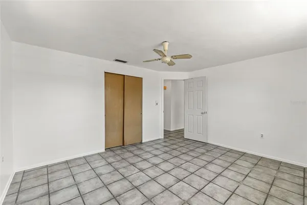 a view of an empty room and window
