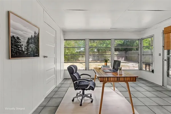 a view of an empty room and window