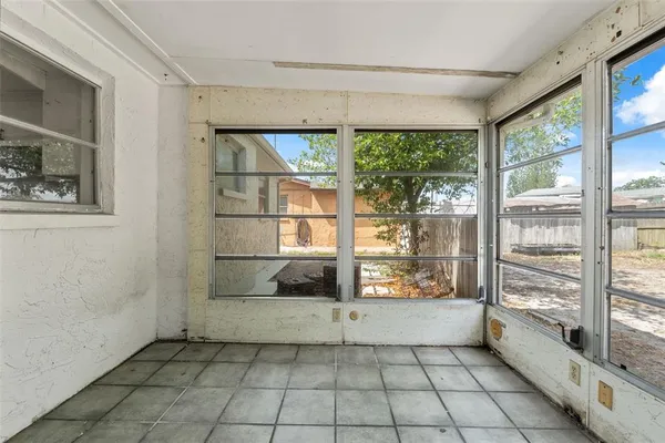 a view of porch with a backyard