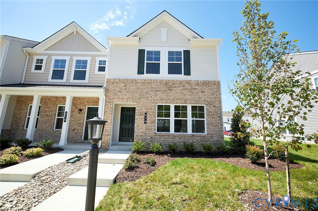 214 Greenpark Road Sandston, VA 23150 - Photo 1 of 50 View of front facade featuring a porch, brick sidi