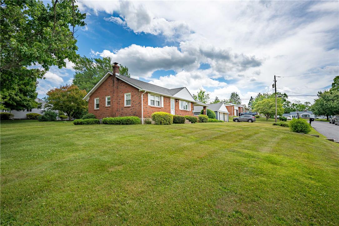 4352 Ruth Road Emmaus, PA 18049 - Photo 23 of 33 A well-maintained brick residence set on a gently sloping, verdant lot with mature trees.
