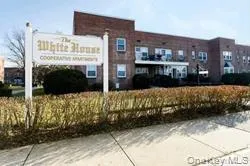 a view of a building with a street