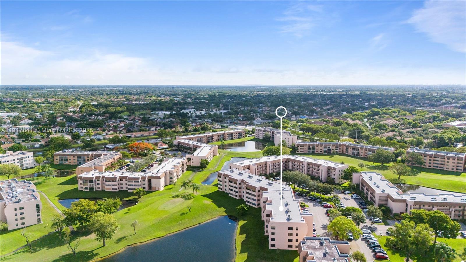 10207 Sunrise Lakes Boulevard, Unit 203 Sunrise, FL 33322 - Photo 29 of 39 a view of a city with mountains in the background