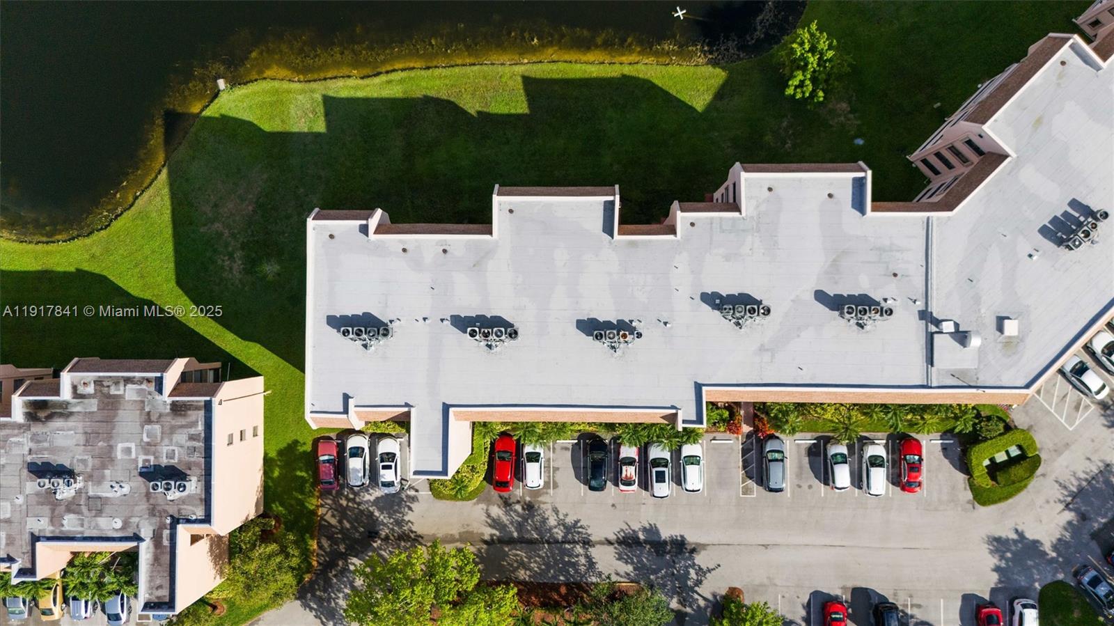 10207 Sunrise Lakes Boulevard, Unit 203 Sunrise, FL 33322 - Photo 32 of 39 an aerial view of a building with an outdoor space